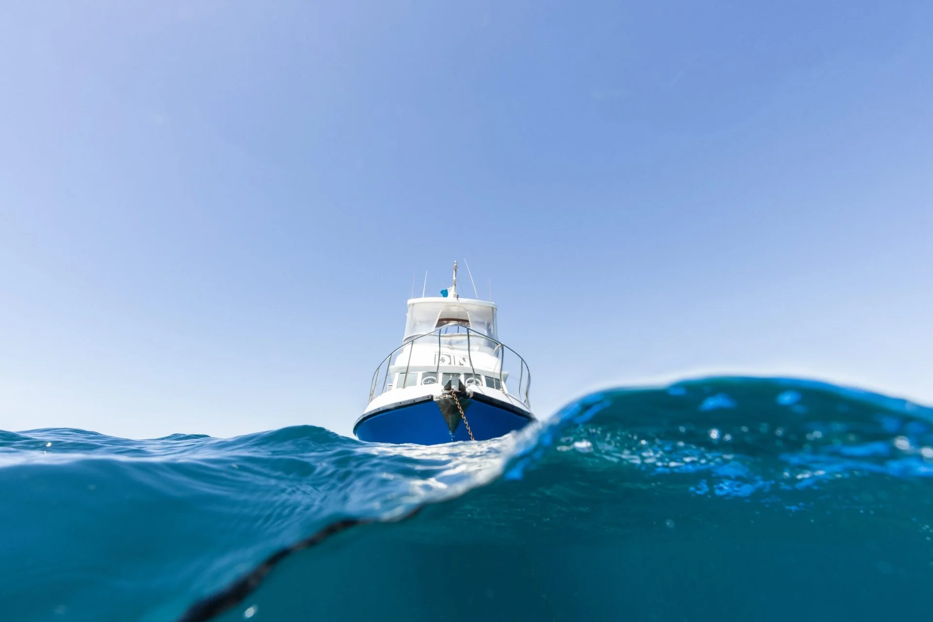 Dive Ningaloo boat at anchor, seen from water level